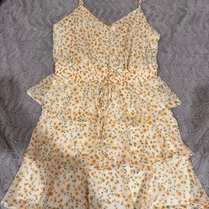 Francesca’s yellow floral dress